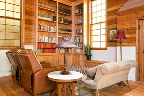 Library with seating area for a cozy afternoon with a book.