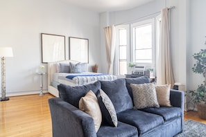 LIVING ROOM AREA: Includes (1) Queen bed & (1) Sofa Bed with all pillows, linens and blankets as well a 50 inch ROKU Smart TV