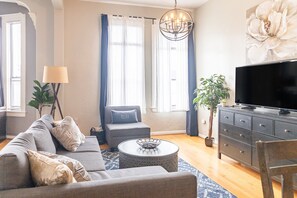 Sit back and relax in the living room area that includes (1) Queen bed and (1) Sofa bed as well as 50 inch ROKU Smart TV