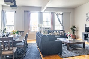 Sit back and relax in the living room area that includes (1) Single bed as well as a 50 inch ROKU Smart TV