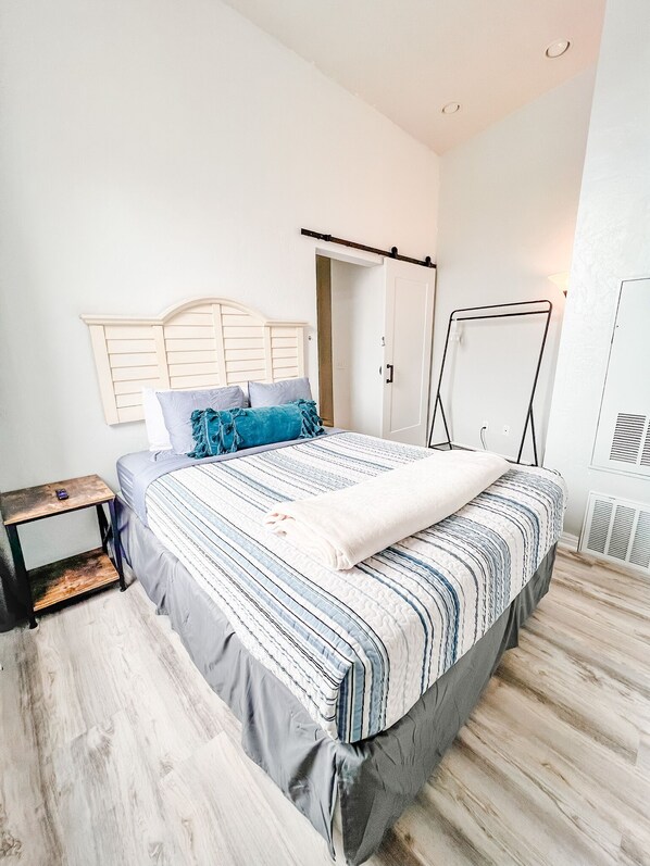 Welcome to your 700 sq ft suite with high ceilings.  BEDROOM No. 1: Includes (1) Queen bed with all pillows, linens, and blankets as well as a 50-inch ROKU Smart TV (Central HVAC throughout entire suite)