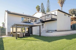 Soak up the sun out in the expansive yard with plenty of room for the kids to enjoy