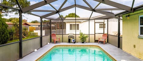 Screened pool with BBQ grill