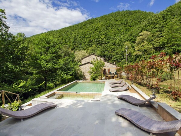 Sky, Plant, Cloud, Plant Community, Nature, Tree, Water, Building, Swimming Pool, Outdoor Furniture