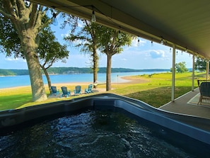 Soak away your cares while enjoying the lake view!