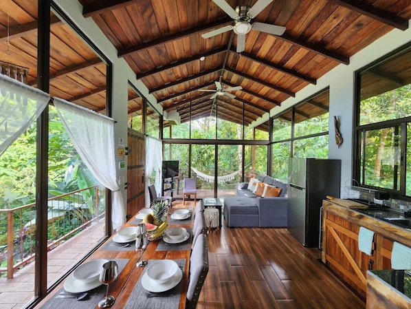 Interior View of Living Room, Dining and Kitchen Area