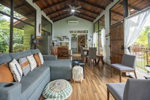 Interior View of Living Room, Dining and Kitchen Area