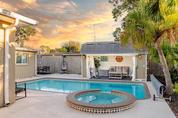 Welcome to Seminole, FL. Located a short drive away from the beautiful west coast beaches of Florida. Come stay at our cozy home and enjoy the backyard oasis featuring heated pool, hot tub, grill, outdoor dining/bar seating , fire pit, sun loungers, and covered sofa seating with smart TV! 