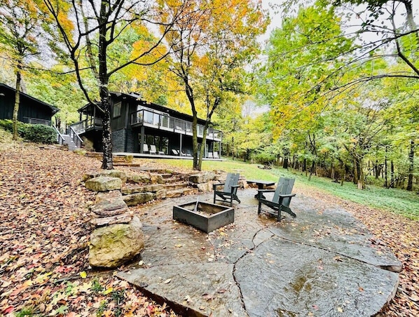 Located on Mount Sequoyah, the newly-remodeled Woods on Sequoyah has TWO luxury units overlooking the Ozarks.Out back, walk down the stone pathway to access our third outdoor seating area, which has a fire pit (newly added) and plenty of seating.