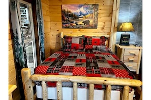 Get cozy in the Bear Den. Made in USA log beds, and premium mattresses.