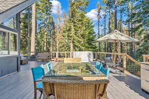 Exterior: Large back deck, outdoor seating for 12, 6-person outdoor dining table, gas BBQ, recessed hot tub
