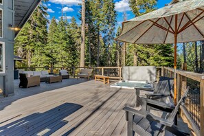 Exterior: Large back deck, outdoor seating for 12, 6-person outdoor dining table, gas BBQ, recessed hot tub
