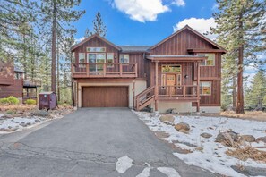 Exterior: On-site parking for 4 vehicles (2 in garage, 2 in driveway)