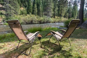 In the summer months relax at the private river access the cottage shares with one other home.