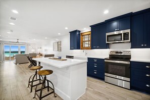 Large kitchen for cooking and family gatherings.