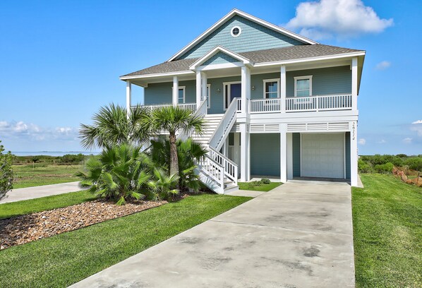 Plenty of parking on the paved drive of this beautiful home.