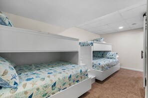 Brand new bunk room in the walkout basement, full beds on bottom w/twins on top