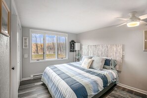 Main floor bedroom with a king bed