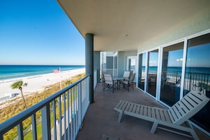 Step out onto your extra large beachfront balcony