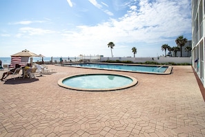 Pool and ocean in front of the condo