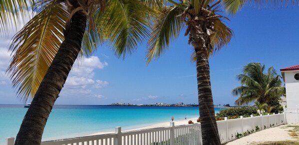 A few steps into the tranquil ocean. Simpson bay beach from our condo. 