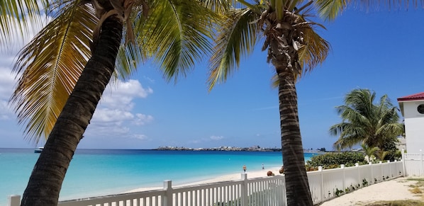 A few steps into the tranquil ocean. Simpson bay beach from our condo. 