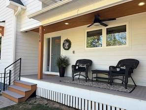 Front porch with comfy chairs.