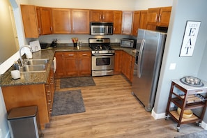 Enjoy an open airy fully equipped kitchen ready to cook a feast or snack.