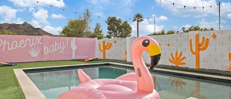 Your eclectic colorful pool home in Phoenix awaits!