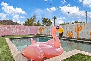 Your eclectic colorful pool home in Phoenix awaits!