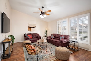 Formal living room with smart TV