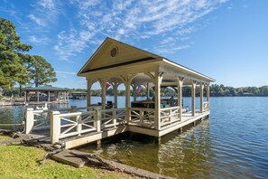 Boat Dock | Boat will stay at the property but is not available.  There are spaces to park a boat on either side and along the boardwalk