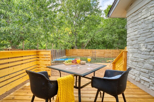 Relax on the cozy patio while your friends and family play ping pong, mini volleyball, badminton and cornholes