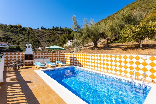 Private pool, terrace, and garden with sea views