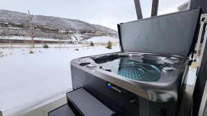 Relax away in the brand-new private hot tub as you take in the stunning views and fresh mountain air.