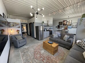 Living Room features couch, love seat, rocker, and sleeper sofa.