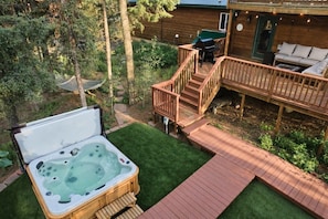 An overview of the backyard with hot tub!