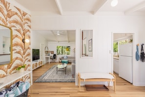 Entry way leads to the kitchen and living room. 