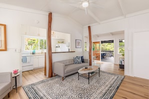 Open floor plan looking out towards the lanai. 