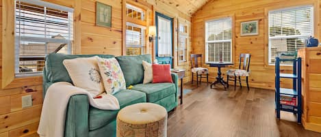 Spacious room featuring a Lazy-Boy love seat (full-size sleeper).