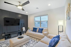 Living Room | Queen Air Mattress | Smart TV | Home Theater System | Board Games