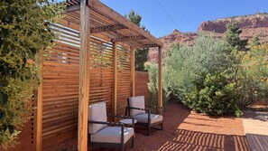 Enjoy your morning cup of coffee as you watch the red hills come alive under the rising sun, or relax after a day of adventures and enjoy the painted sunset skies that only Southern Utah can produce