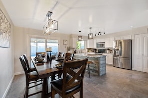 Open floor plan of kitchen/dining room area.