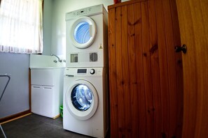 Moden washer and drier, washing products supplied.