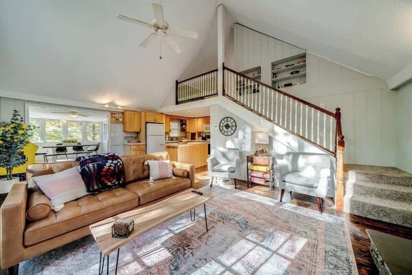 Spacious living room with a  wood fireplace!