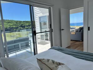 Lay in the comfy bed and watch the waves roll in. 