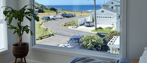 Stunning picture window to take in the beautiful ocean and headland views! 