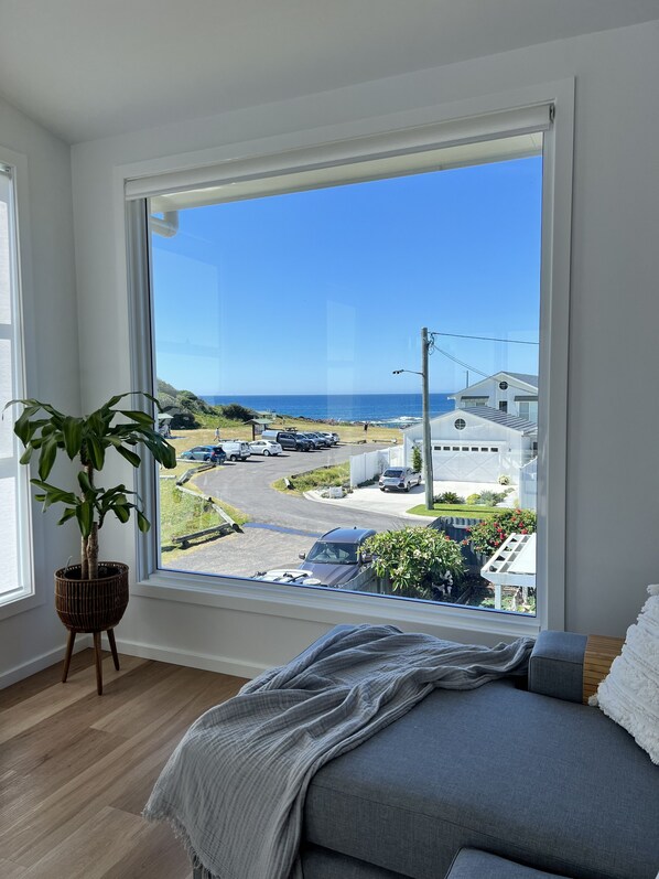 Stunning picture window to take in the beautiful ocean and headland views! 