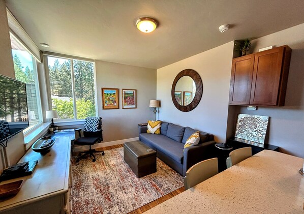 Cozy living and with a 5-way adjustable work chair and a full-size desk.