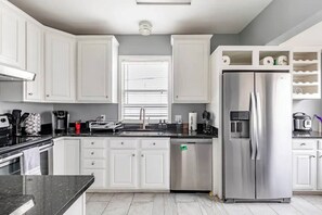 Full kitchen with essentials